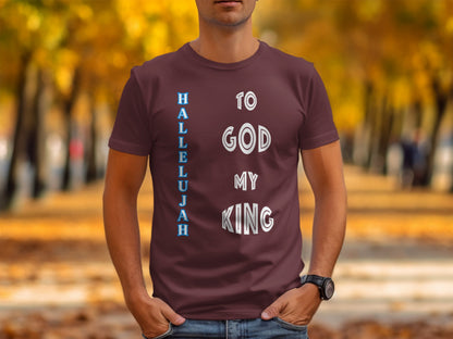 Person wearing a maroon t-shirt with 'Hallelujah to God my King' text in an outdoor setting.