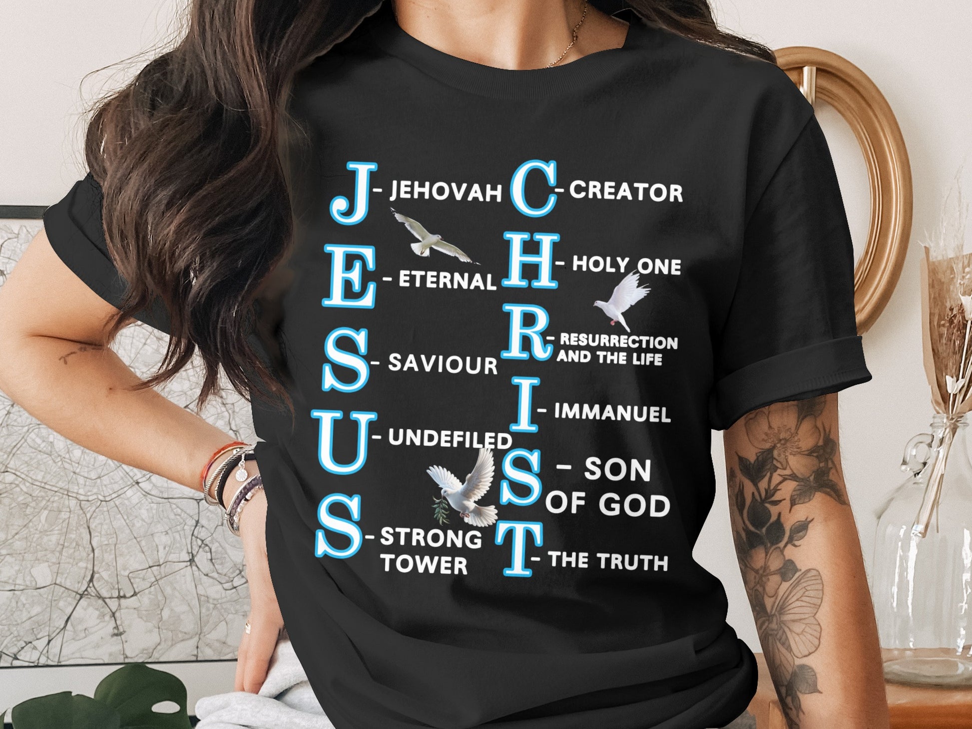 Celebrate the powerful name of Jesus Christ with this soft and stylish Bella+Canvas 3001 unisex t-shirt, featuring a creative acronym where each letter unveils a faith-filled word—J for Jehovah, E for Eternal, S for Saviour, and more. The design is complemented by three peaceful doves, symbolizing the Holy Spirit and divine peace.