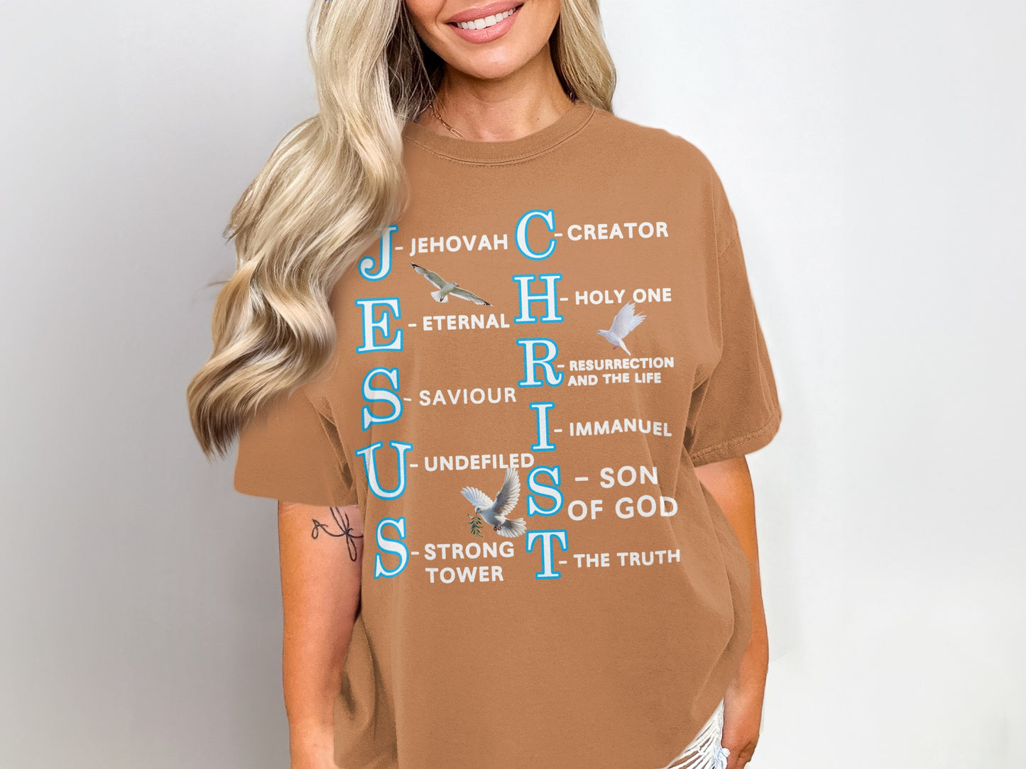 This vintage-washed Comfort Colors 1717 unisex t-shirt features a meaningful and symbolic&nbsp;Jesus Christ acronym—each letter standing for a core biblical truth (like “C for Creator”)—alongside a graceful trio of peaceful doves symbolizing the Holy Spirit. Perfect for wearing your faith with depth and visual beauty.