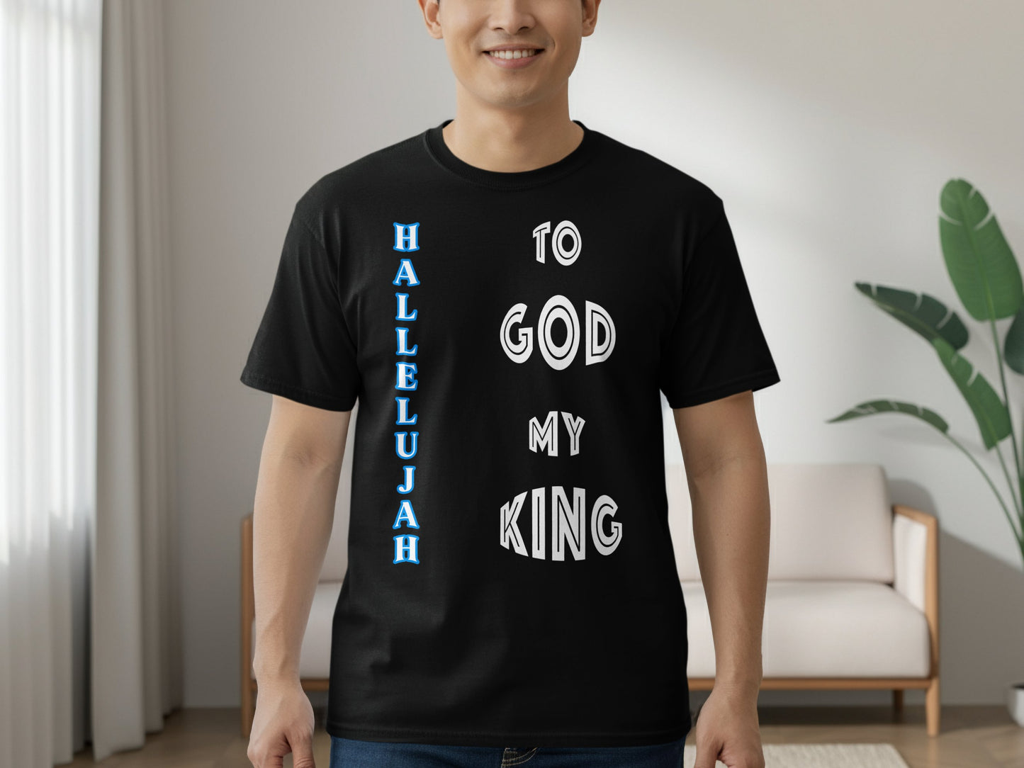 Person wearing a black t-shirt with 'Hallelujah to God my King' text in a living room.