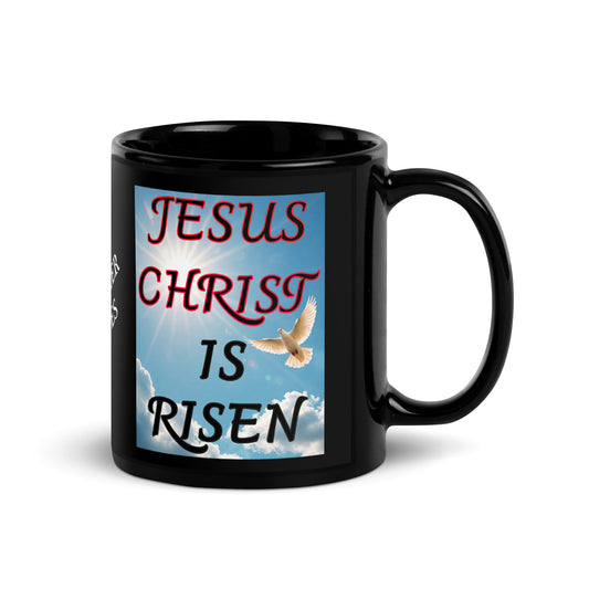 Celebrate the resurrection every day with this beautifully designed ceramic black mug featuring:

"Jesus Christ is Risen" with a peaceful dove on both sides
"My Redeemer Lives" boldly written in the center