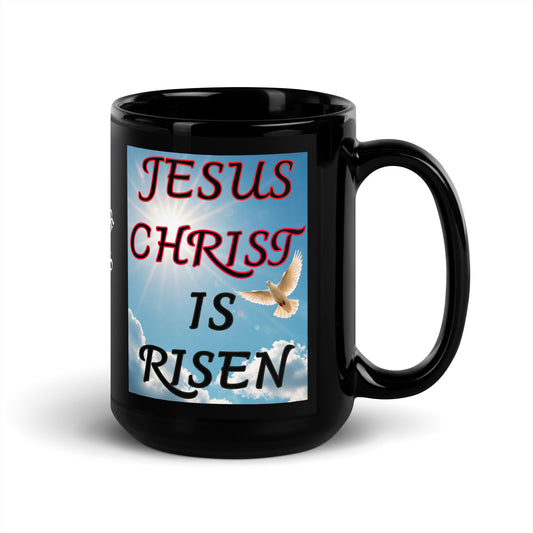 Celebrate the resurrection every day with this beautifully designed ceramic black mug featuring:

"Jesus Christ is Risen" with a peaceful dove on both sides
"My Redeemer Lives" boldly written in the center