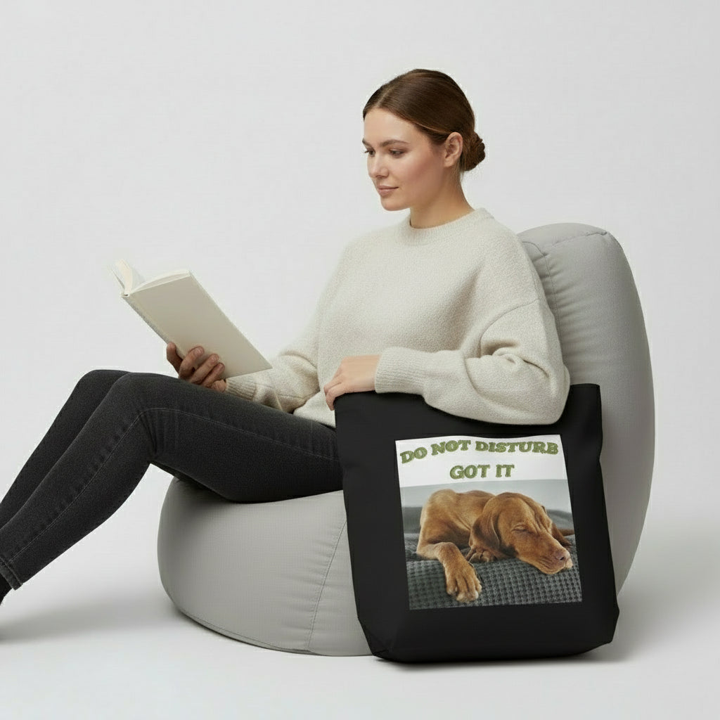 Keep it calm and cozy with this “Do Not Disturb – Got It” tote bag featuring a peacefully snoozing pup. Whether you’re running errands or heading out for a chill day, this playful tote is perfect for dog lovers and introverts alike. It’s lightweight, durable, and adds just the right touch of humor to your daily routine.