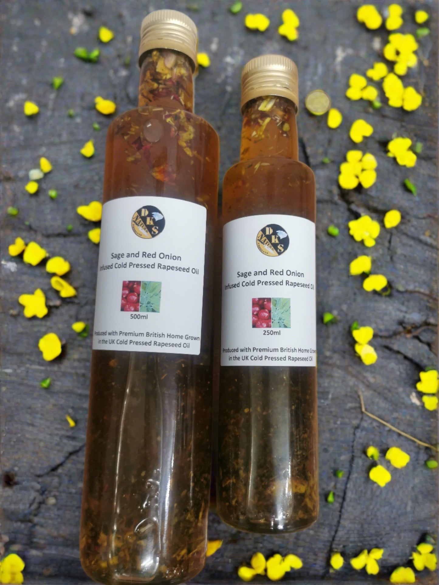 Sage and red onion infused rapeseed oil is in a glass bottle with some bits of sage and red onion in the bottle as well as the rapeseed oil.