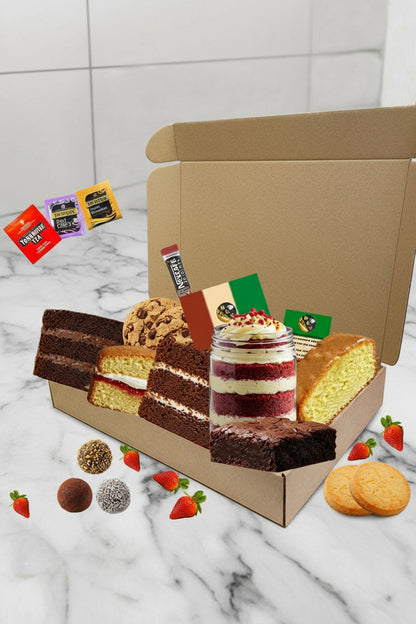 Ultimate Treat Box with cake jar, brownies, truffles, and cookies arranged neatly”

 layered cake jar with buttercream inside handmade Ultimate Treat Box”

“Assorted brownies and truffles from Ultimate Treat Box gift set”

cookies and shortbread biscuits in Ultimate Treat Box gift box”

Ultimate Treat Box, a safe handmade gift for birthdays, celebrations, or afternoon tea”