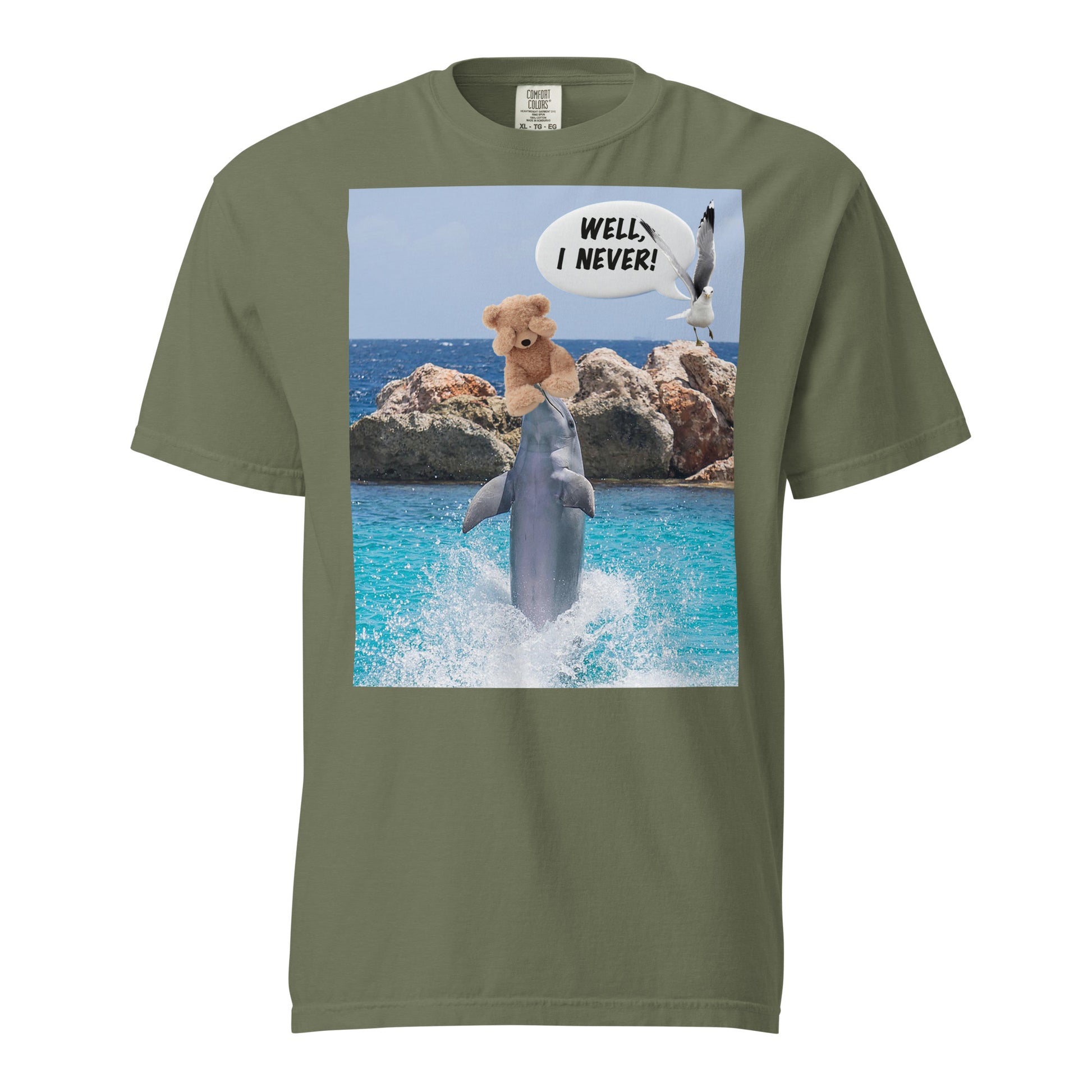 This Comfort Colors 1717 Unisex t-shirt brings the same funny, imaginative design in a garment-dyed, vintage-feel shirt. Featuring a dolphin balancing a scared cuddly teddy bear and a shocked dove saying&nbsp;"Well I never," it’s the perfect combo of humor and soft-washed comfort. The relaxed fit and sturdy feel make it great for lounging, gifting, or beach strolls.