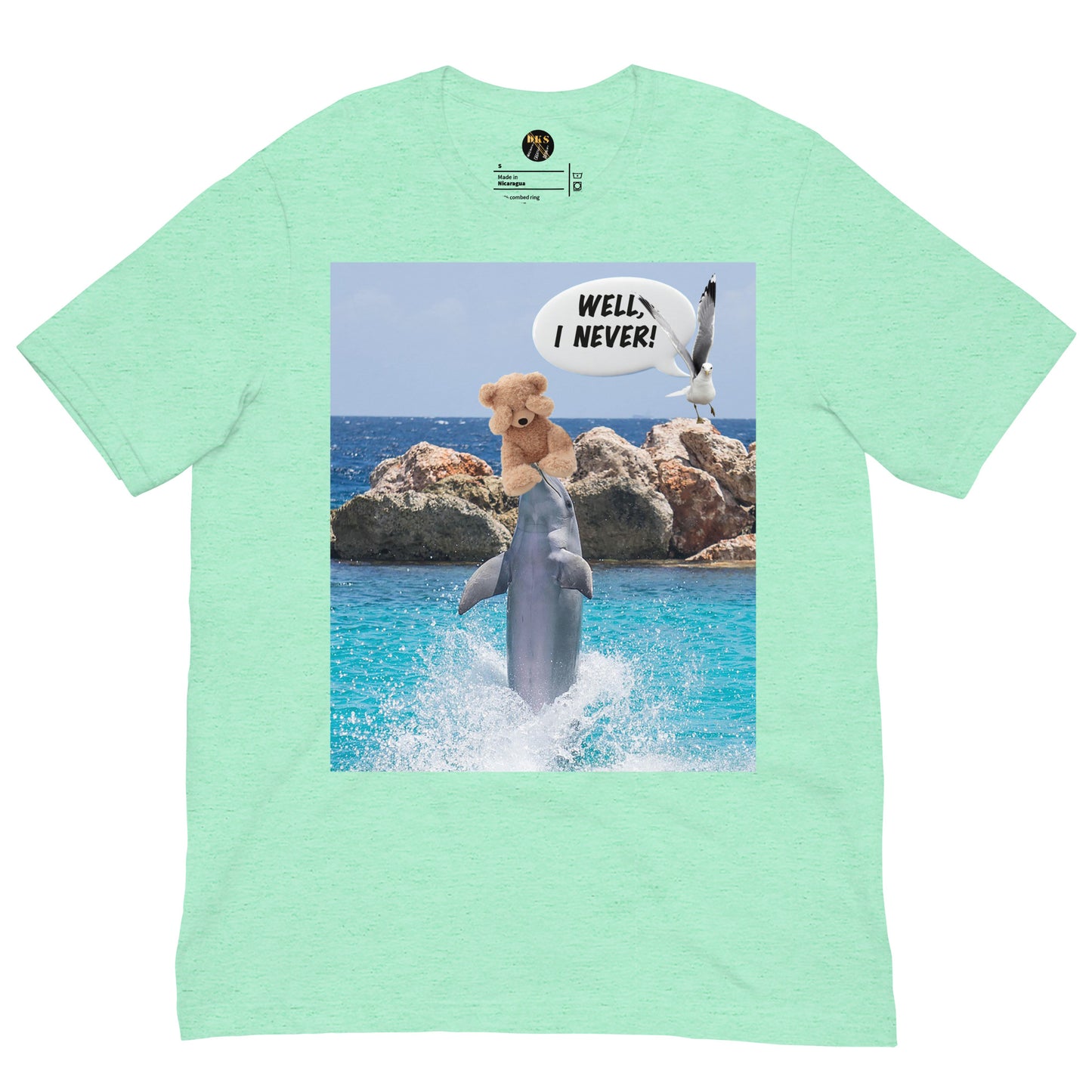 This unisex Bella+Canvas 3001 t-shirt features a playful dolphin juggling a scared teddy bear while a dove looks on, astonished, and exclaims "Well I never!" Made from 100% combed and ring-spun cotton, it's lightweight, soft, and perfect for everyday wear with a modern fit. Ideal for animal lovers, beach vibes, or anyone with a quirky sense of humor.