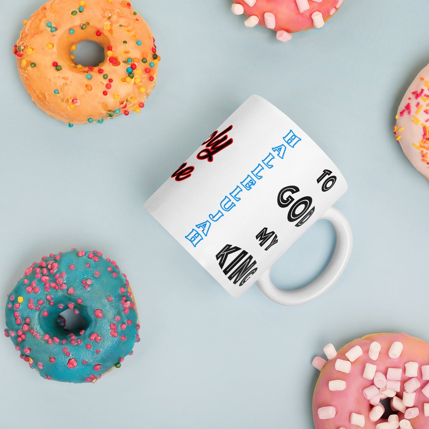 Glorify the King with every cup! This powerful white ceramic mug features&nbsp;"Hallelujah to God My King" boldly displayed on both sides and "Holy One" in the center — creating a faith-filled reminder of God's majesty.