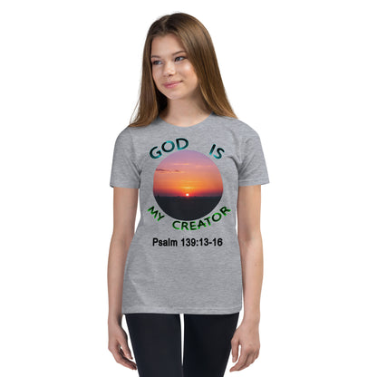 Let your child wear a message of purpose and divine love with our “God Is My Creator” youth bella canvas 3001Y unisex t-shirt. Featuring the powerful scripture Psalm 139:13–16 and a peaceful sunset image, this tee reminds young hearts they are wonderfully made by God.